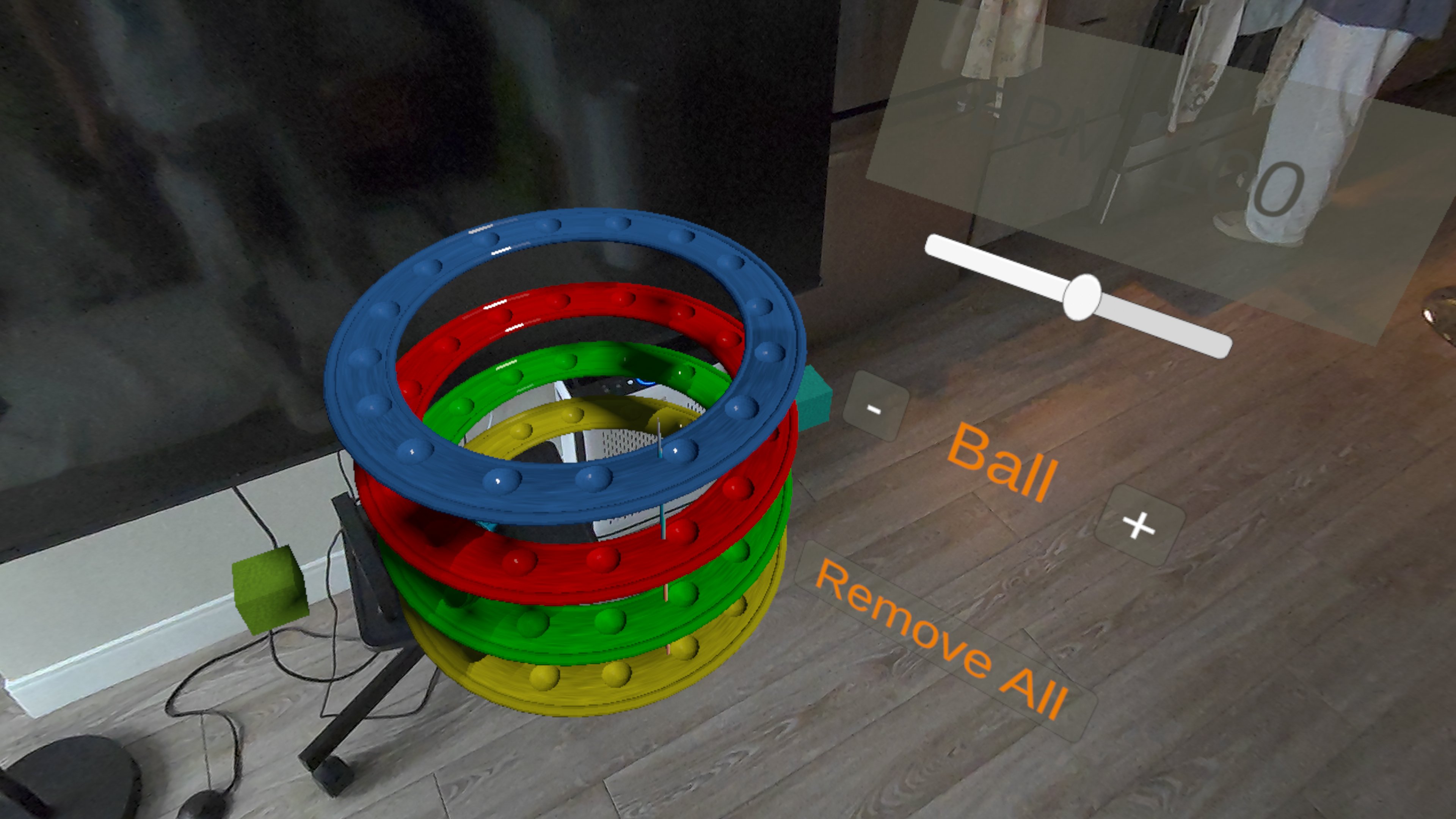 SynOrbit interface showing stacked colored rings and ball controls